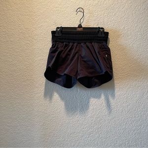 Lululemon black Tracker lined active/running shorts, size 6